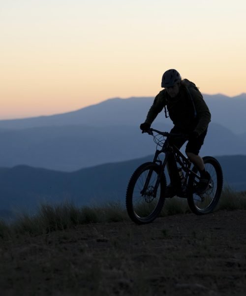 young-adult-using-electric-bike-country-side (1)